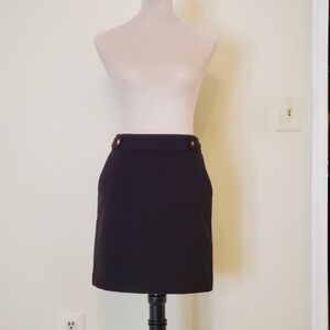 H&M Women's mini skirt, size 6, solid black.